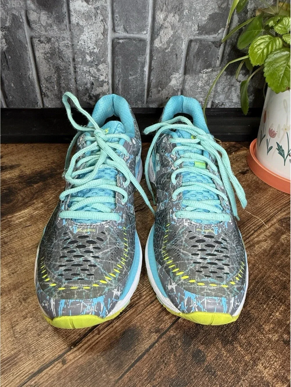 ASICS Gel-Kayano running shoes in a gray/blue/turquoise colorway, Women’s US 7.5